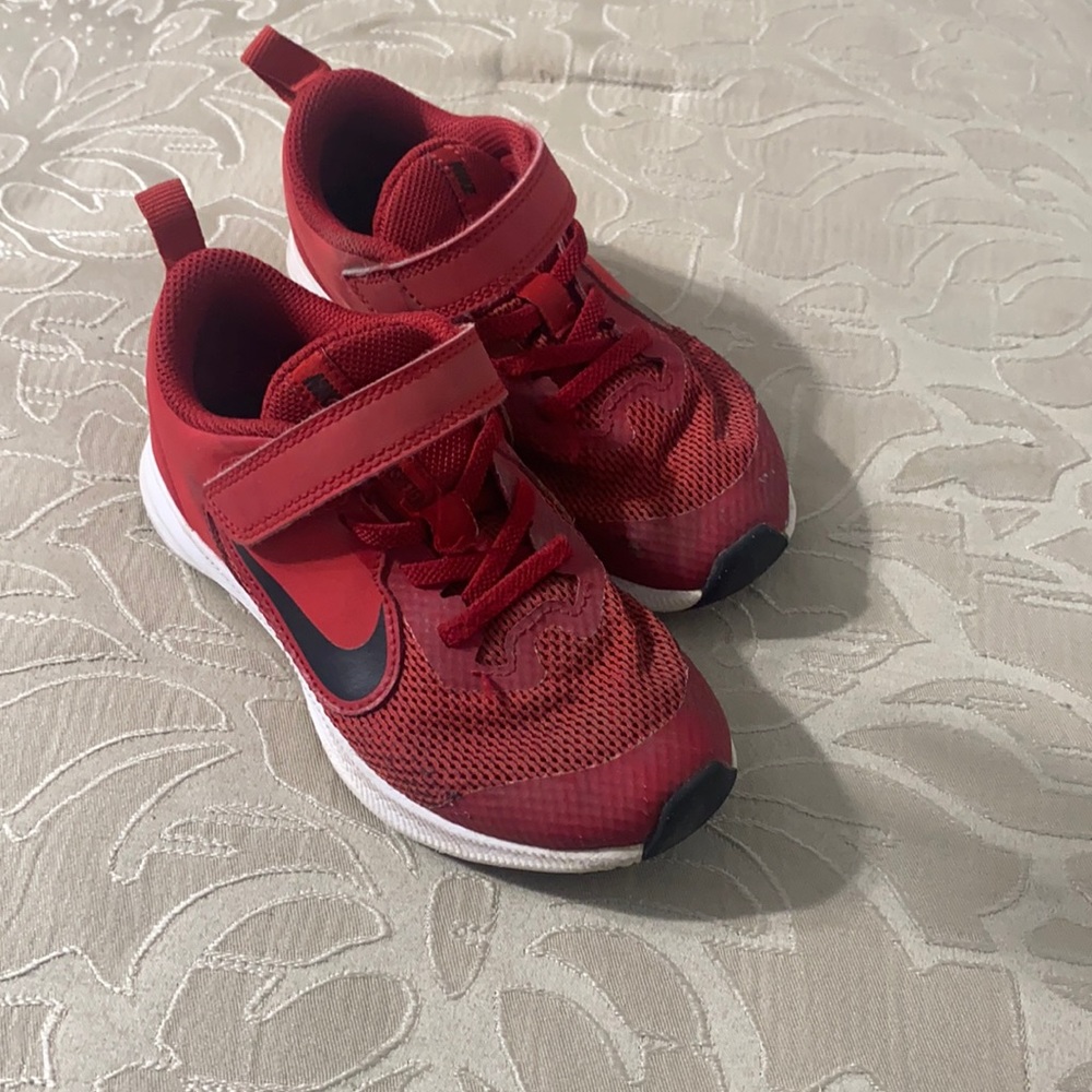Red Nike running shoes size 11c boys